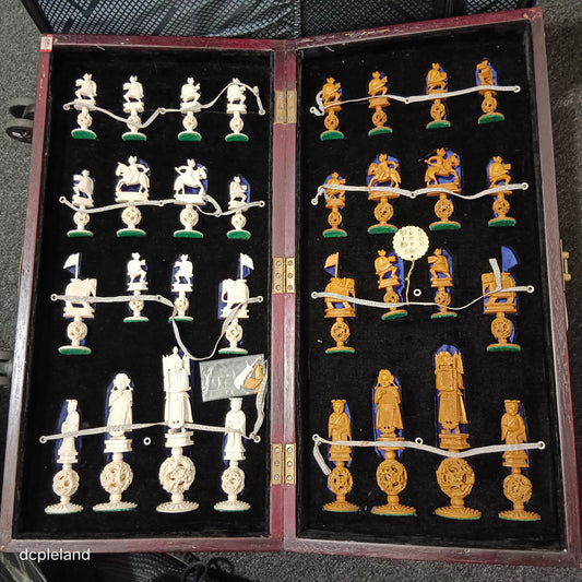 Chess Set Hong Kong 1955 pre-ban Ivory, with puzzle ball bases in wood box with playing board outside surfaces.